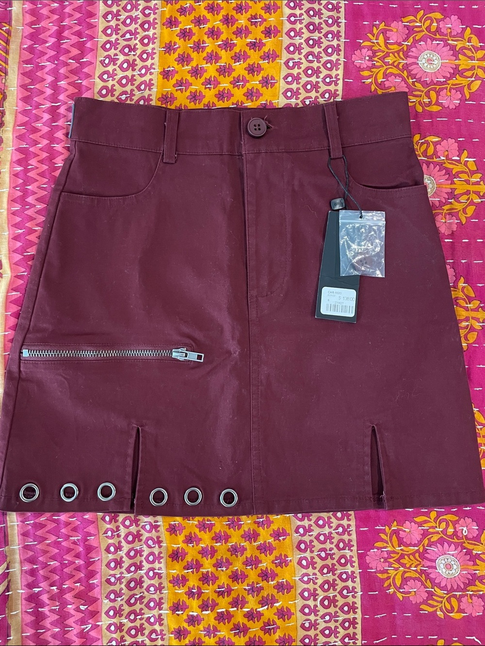 Carmar Maroon Mini Skirt with Grommet & Zip Detail